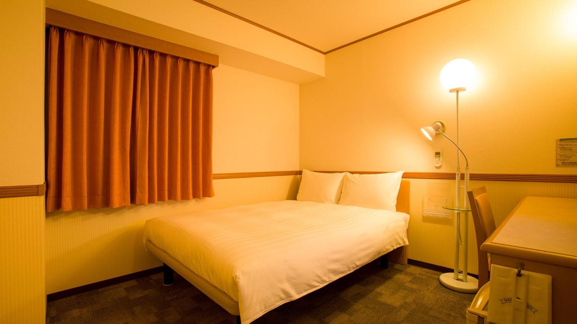 Toyoko Inn Tottori Eki Minami Guchi Rum bild